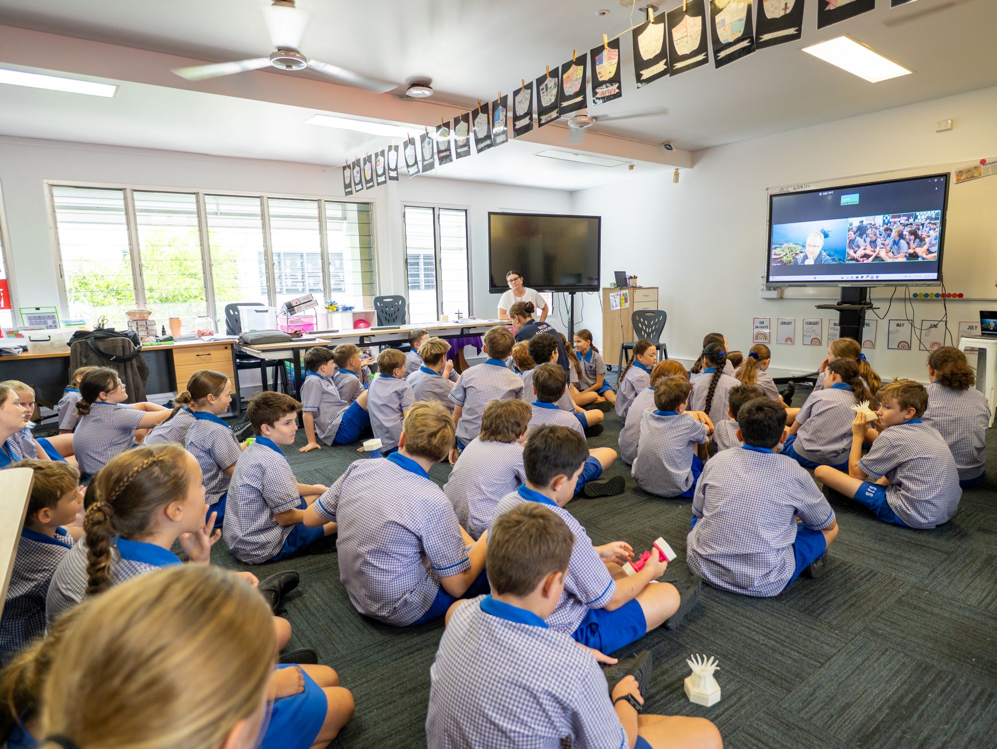 Students from St Joseph's Catholic School listening during the virtual session