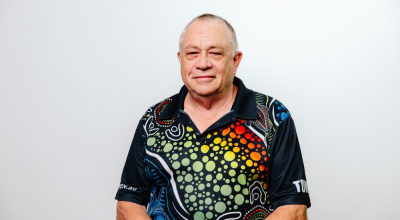 A professional headshot of a staff member of the Reef Authority.