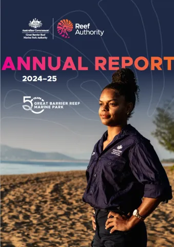 Annual report 2024/25 cover photo of Reef Authority staff member standing on beach with ocean in background