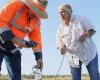 A council worker and Traditional Owner conducting water testing