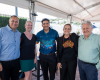Five people including board members and Indigenous Reef Advisory Committee members pose for a photo.