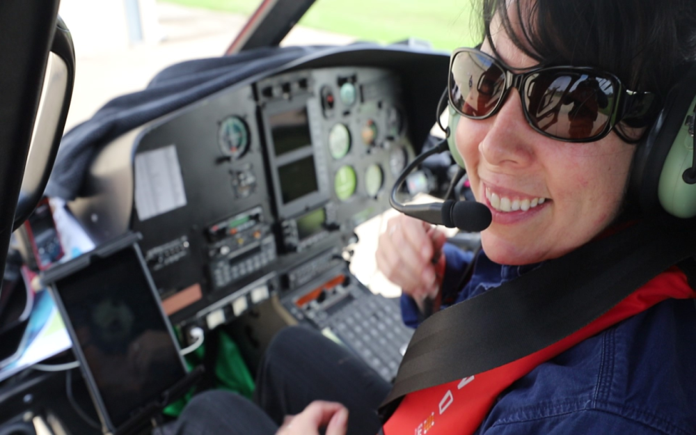 Person in cockpit of aircraft